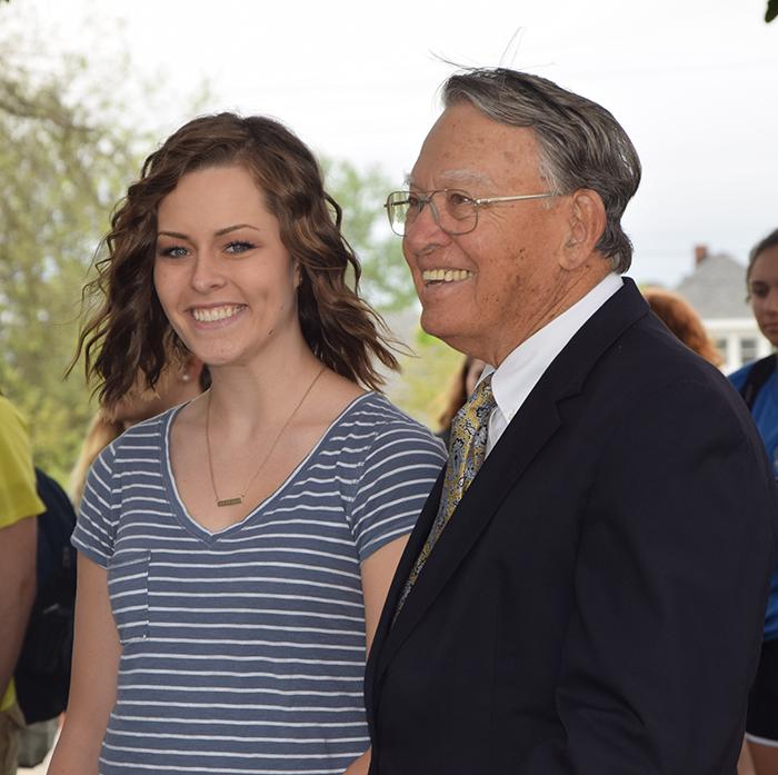 From left George Howell and Shelby White interact during the Earth Day ceremony at Campbellsville University. (Campbellsville University Photo by Brooklyn Kassinger)