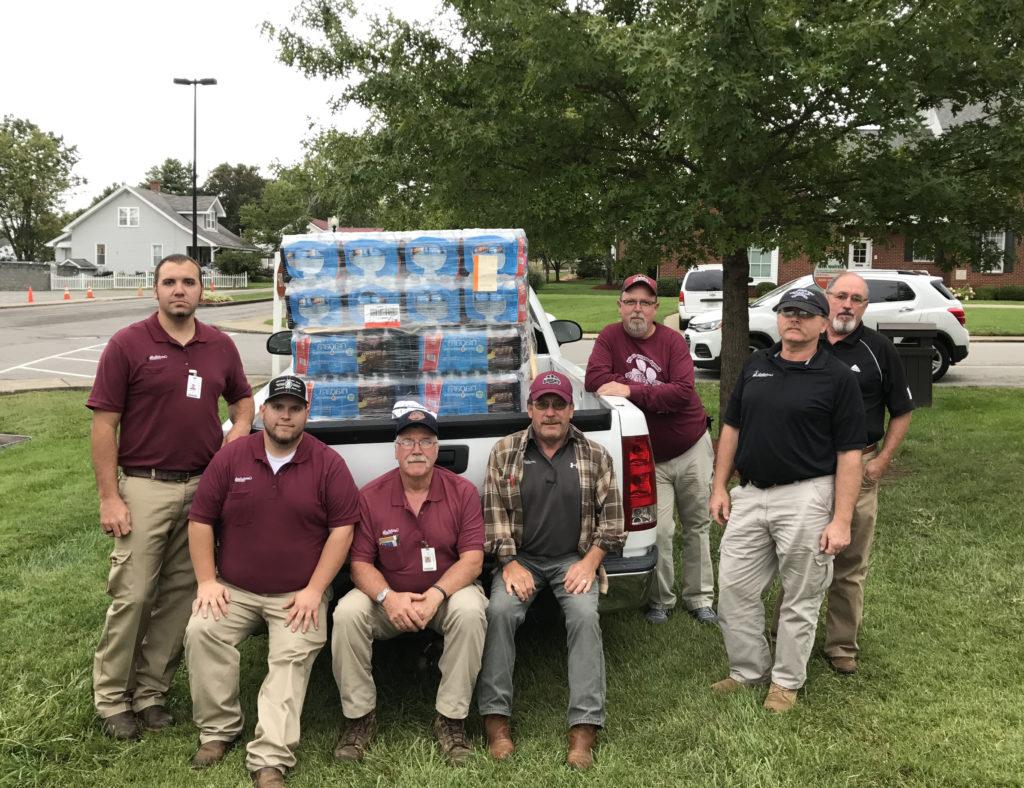 Physical Plant employees, many of whom are not pictured, collected money and partnered with Lowe’s to provide a pallet of water to the Hurricane victims. The employees were inspired by the CU Fishing Team and wanted contribute toward the hurricane relief. From left are: Lynn Henderson, Alvin Humphress, Lloyd Wilds and Christian Cowherd. Back row – Robert Stotts, Stephen Morris and JP Judd.